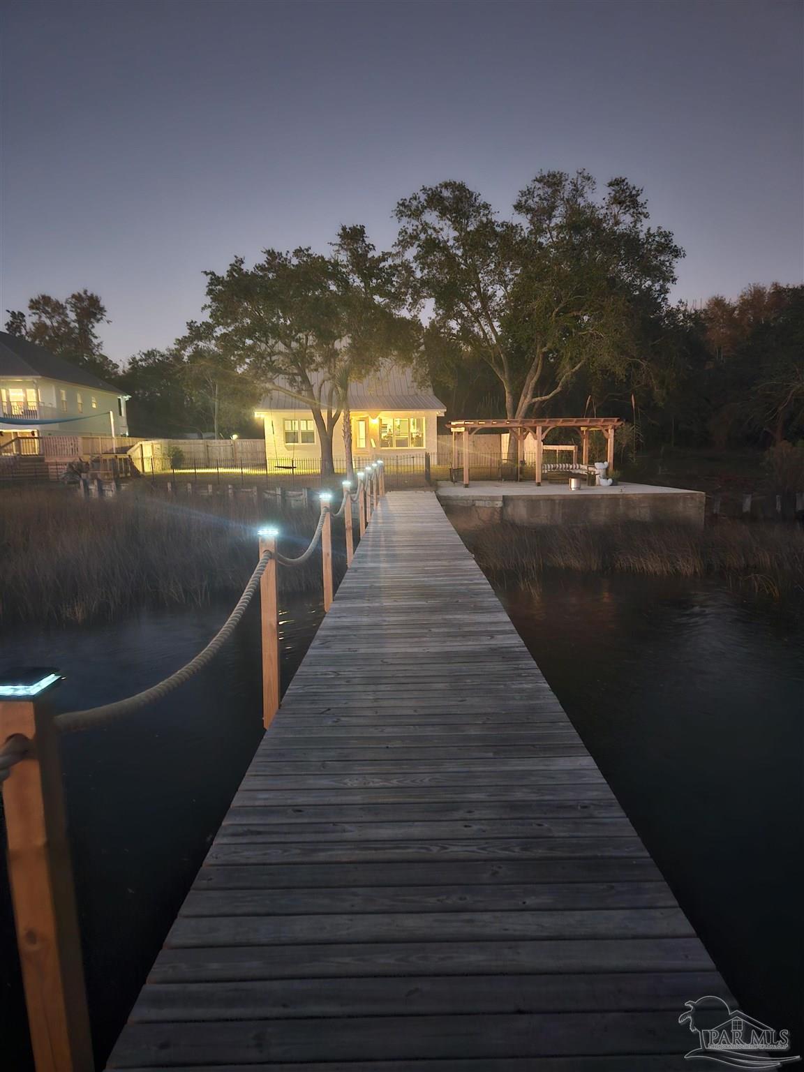 7693 Petersen Point Road Milton, FL 32583 - Photo 30 of 58 a view of outdoor space with seating area