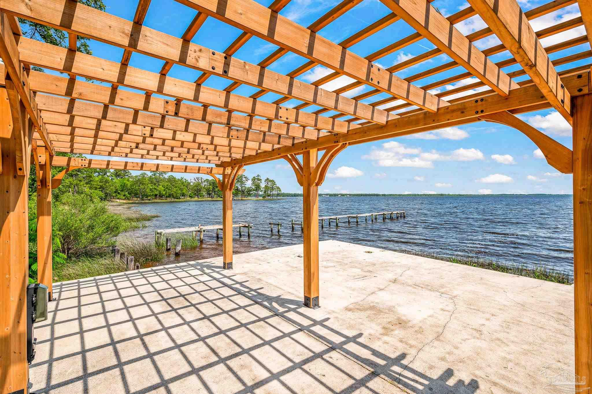 7693 Petersen Point Road Milton, FL 32583 - Photo 53 of 58 a building view with a outdoor space