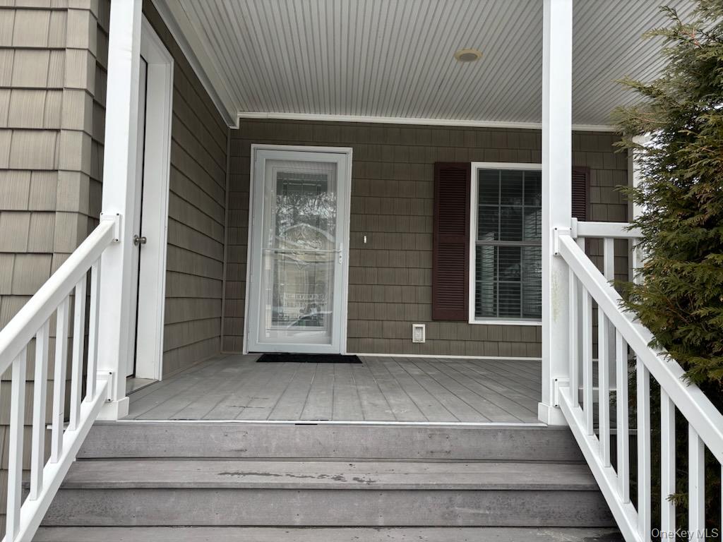 1661 Old Country Road, Unit 539 Riverhead, NY 11901 - Photo 6 of 26 a view of front door of house