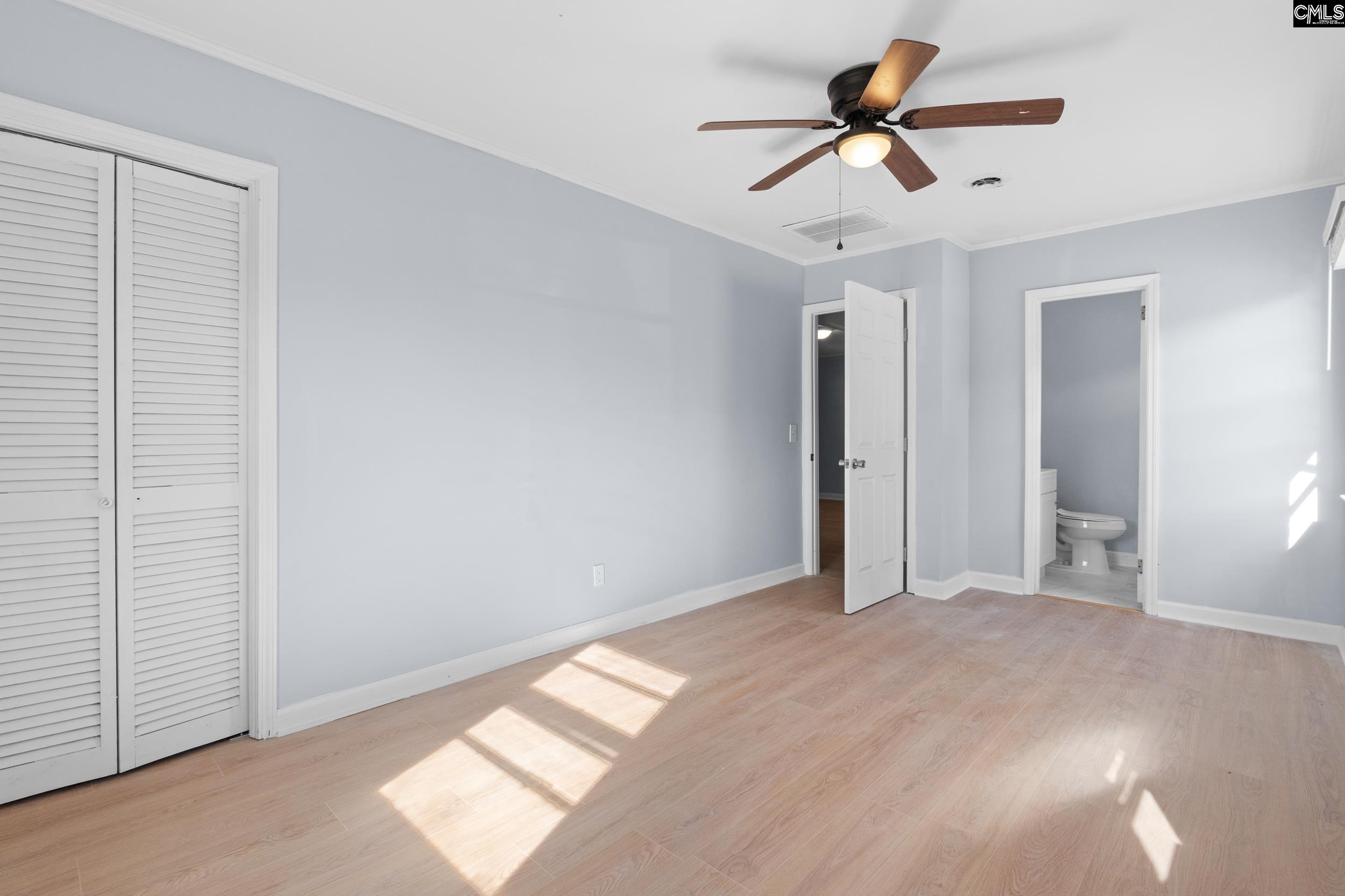 409 Wilkes Road Columbia, SC 29203 - Photo 22 of 34 a view of empty room with ceiling fan
