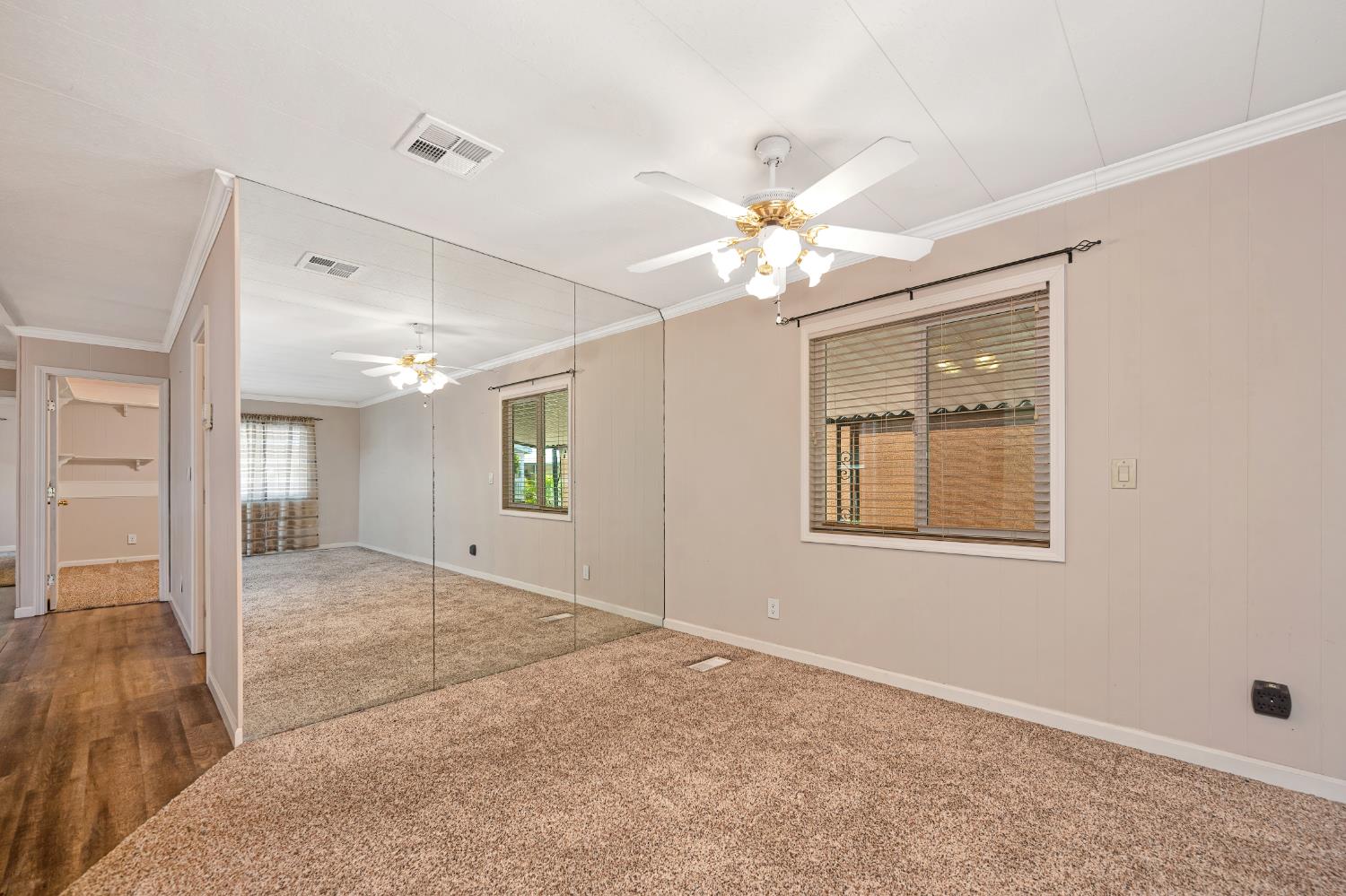 4237 Pinewood Street Rocklin, CA 95677 - Photo 14 of 54 an empty room with fan and windows