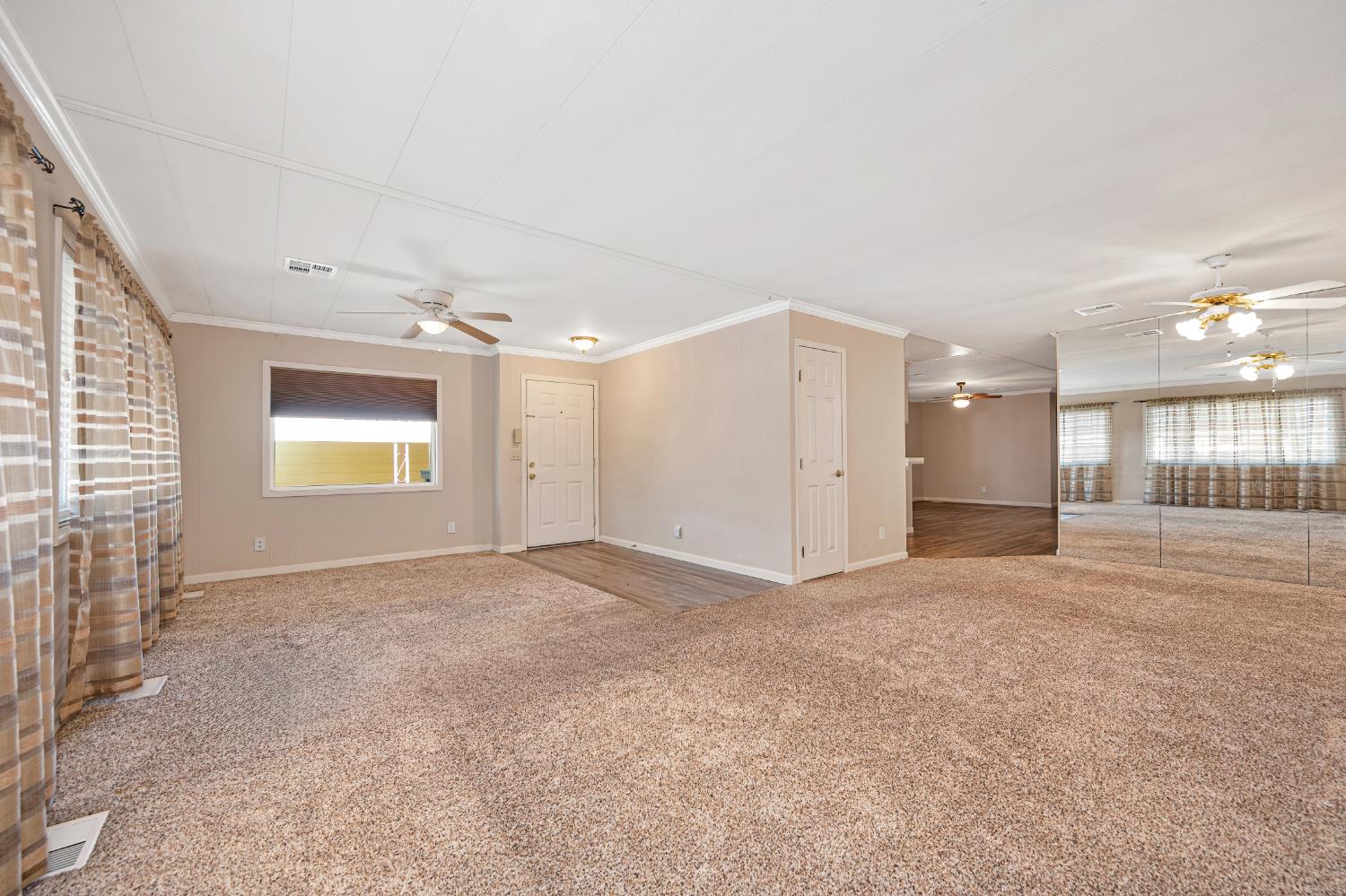 4237 Pinewood Street Rocklin, CA 95677 - Photo 15 of 54 an empty room with a empty space and windows
