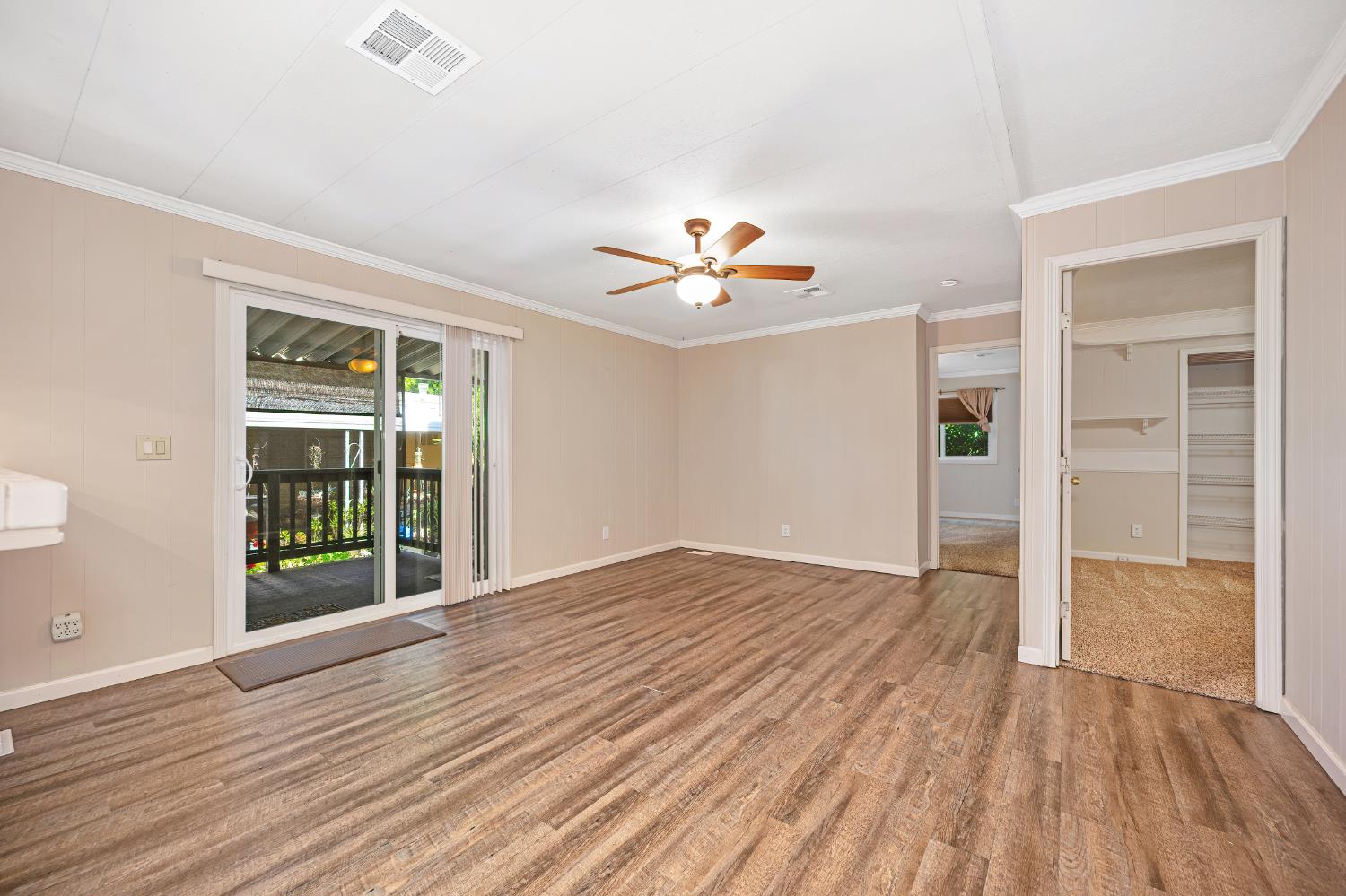 4237 Pinewood Street Rocklin, CA 95677 - Photo 22 of 54 an empty room with wooden floor and windows