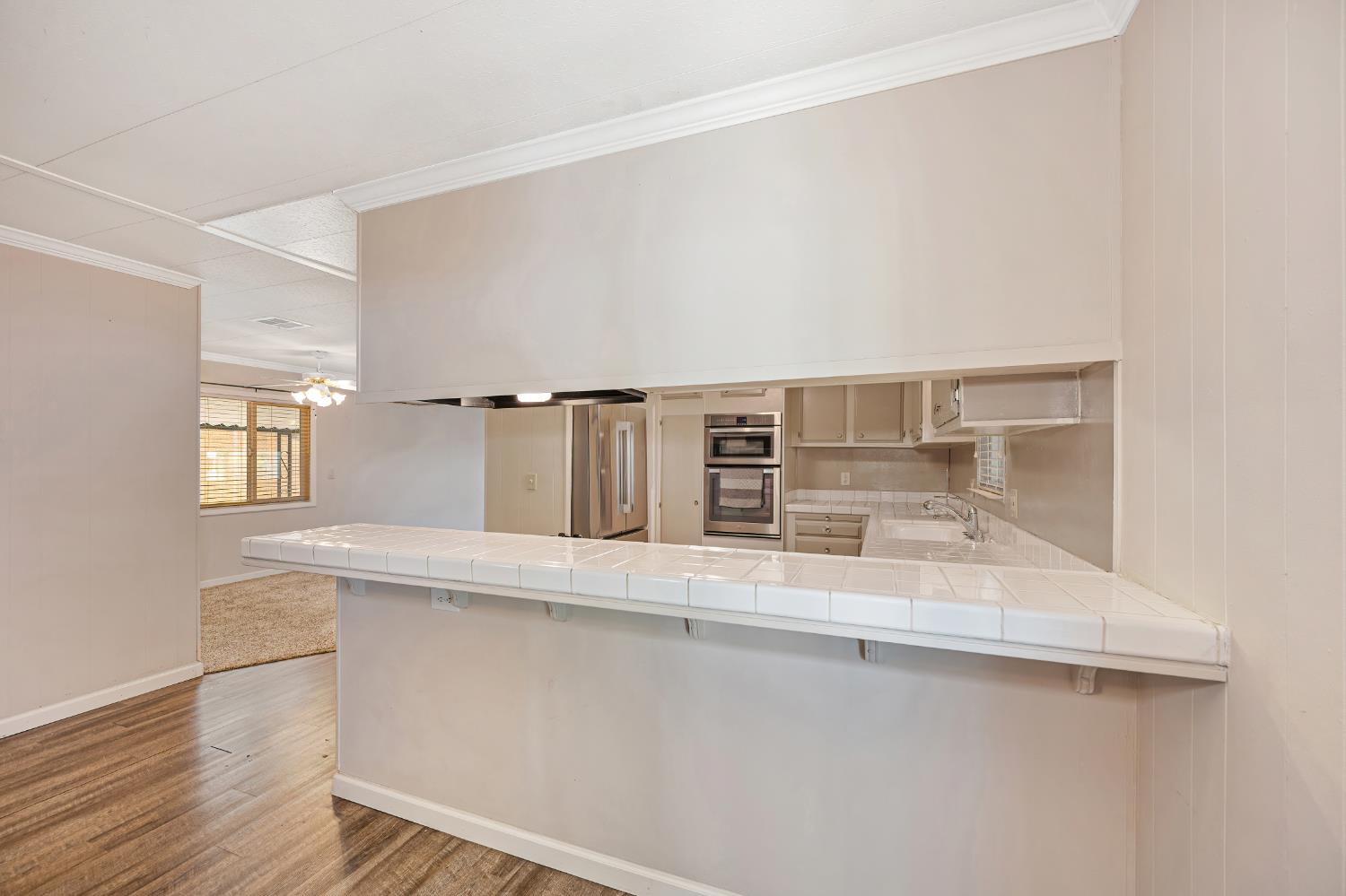 4237 Pinewood Street Rocklin, CA 95677 - Photo 23 of 54 a view of a kitchen cabinets and a window