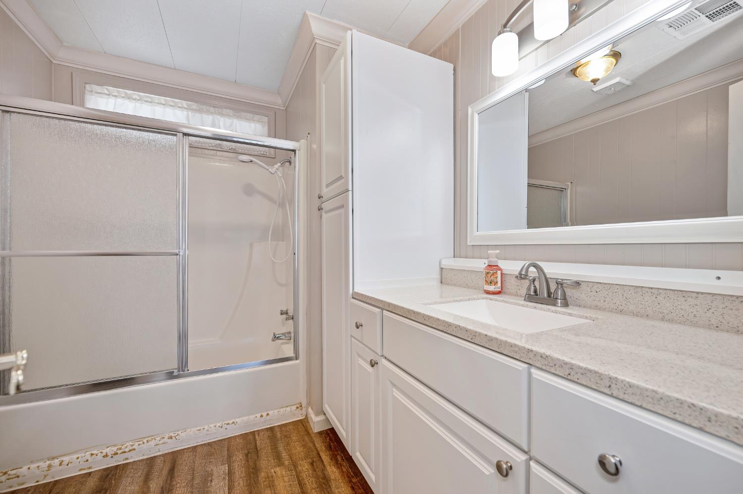 4237 Pinewood Street Rocklin, CA 95677 - Photo 35 of 54 a bathroom with a sink and a mirror