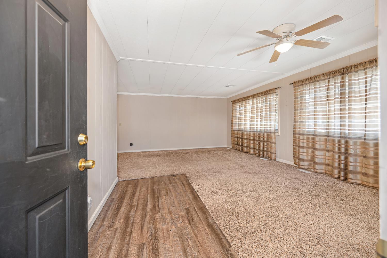 4237 Pinewood Street Rocklin, CA 95677 - Photo 10 of 54 a view of an empty room with a window