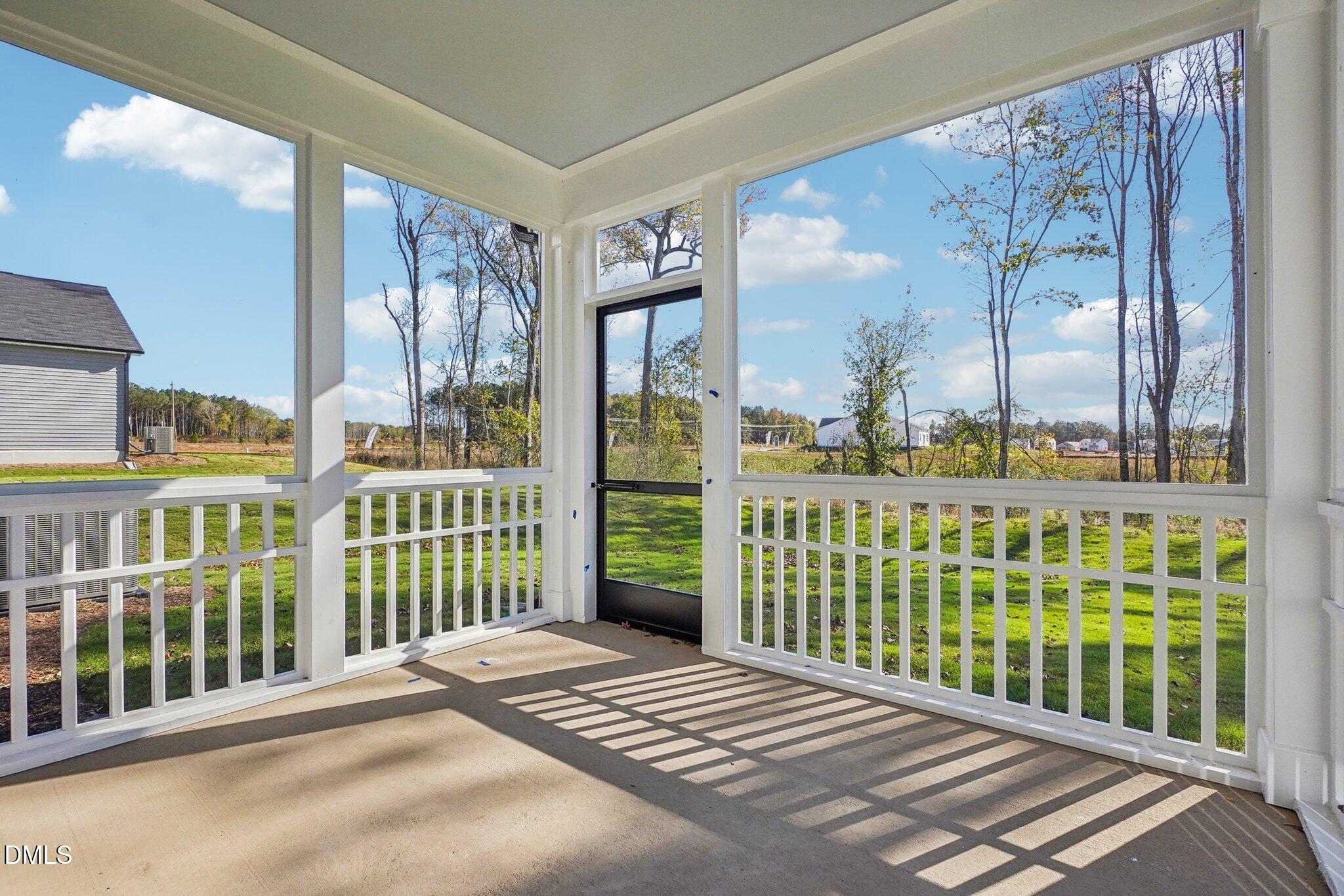 2209 Seraphic Way, Unit 402 Rolesville, NC 27571 - Photo 20 of 26 a view of a city from a balcony