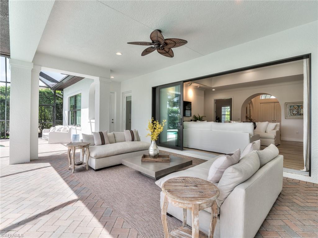 14468 Marsala Way Naples, FL 34109 - Photo 19 of 41 a living room with furniture and a large window