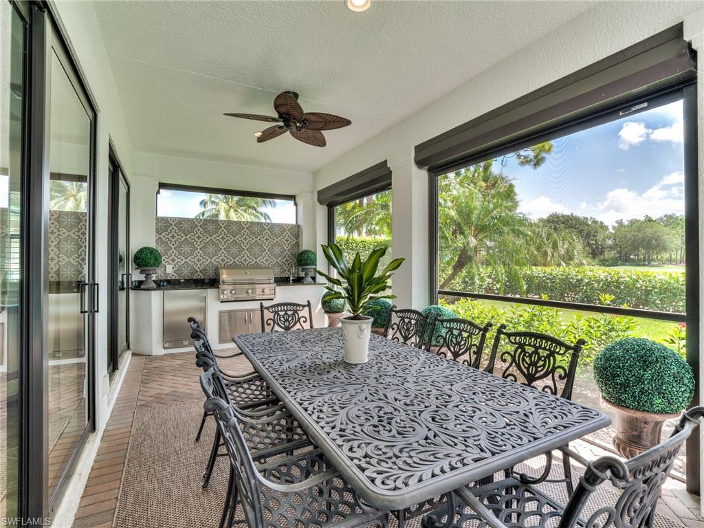 14468 Marsala Way Naples, FL 34109 - Photo 23 of 41 a dining room with furniture window and wooden floor