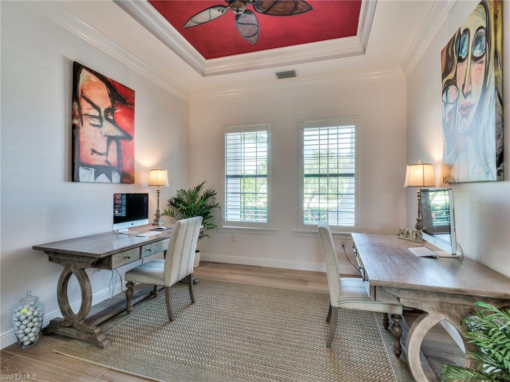 14468 Marsala Way Naples, FL 34109 - Photo 25 of 41 a workspace with furniture and a potted plant