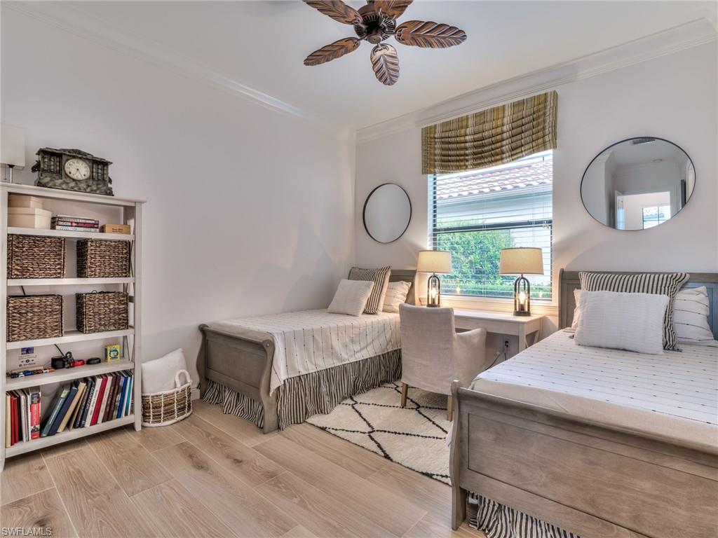 14468 Marsala Way Naples, FL 34109 - Photo 28 of 41 a living room with furniture and a large window