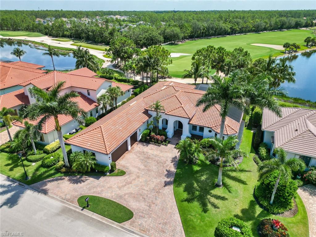 14468 Marsala Way Naples, FL 34109 - Photo 4 of 41 an aerial view of a house with garden space and lake view