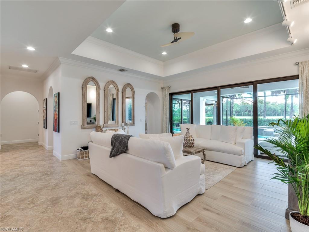 14468 Marsala Way Naples, FL 34109 - Photo 6 of 41 a living room with furniture and a large window