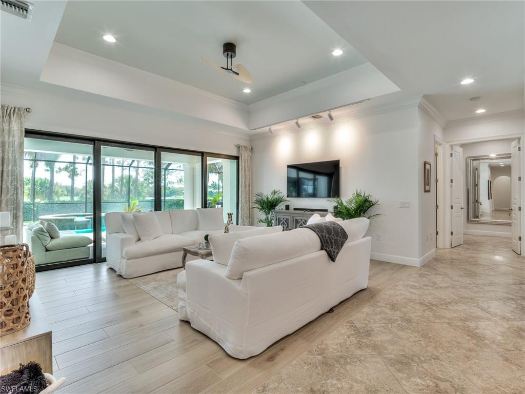 14468 Marsala Way Naples, FL 34109 - Photo 8 of 41 a living room with furniture and a large window