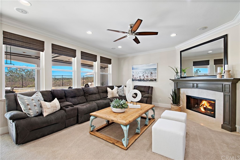 37 Oak View Drive Aliso Viejo, CA 92656 - Photo 16 of 46 a living room with furniture and a fireplace