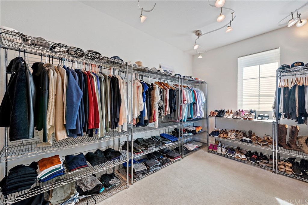 37 Oak View Drive Aliso Viejo, CA 92656 - Photo 29 of 46 a view of walk in closet with clothes and shoes