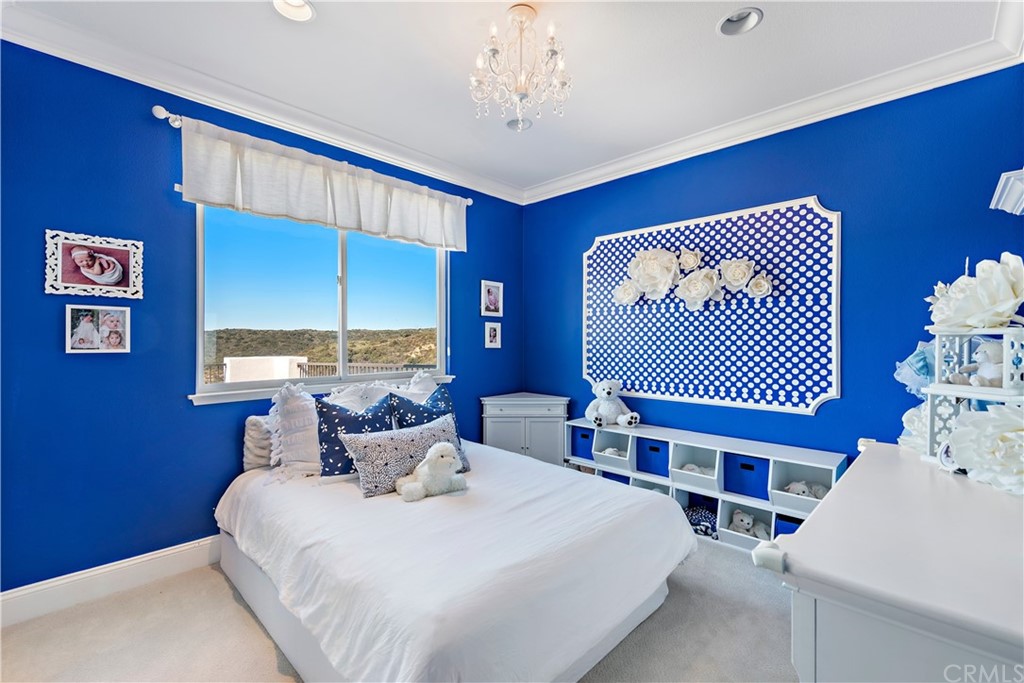 37 Oak View Drive Aliso Viejo, CA 92656 - Photo 31 of 46 a bedroom with a bed and a window