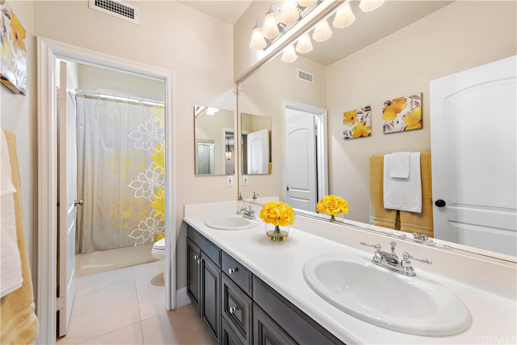 37 Oak View Drive Aliso Viejo, CA 92656 - Photo 32 of 46 a bathroom with a sink double vanity and shower