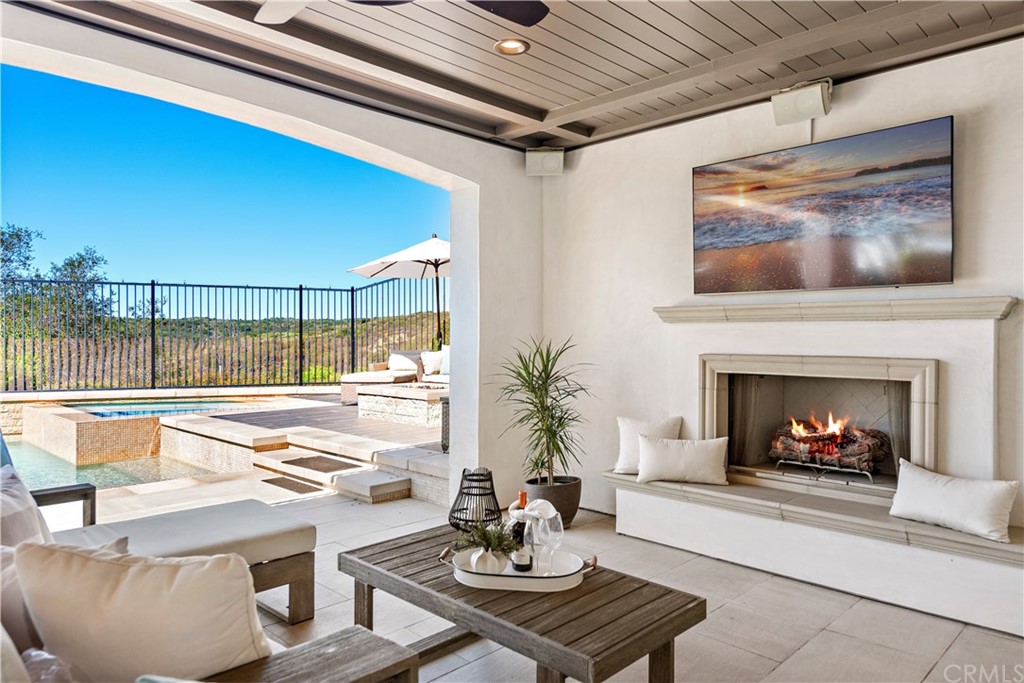37 Oak View Drive Aliso Viejo, CA 92656 - Photo 36 of 46 a living room with furniture and a fireplace