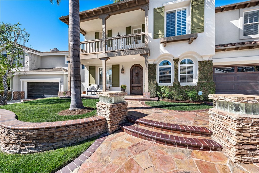 37 Oak View Drive Aliso Viejo, CA 92656 - Photo 41 of 46 a front view of a house with a garden
