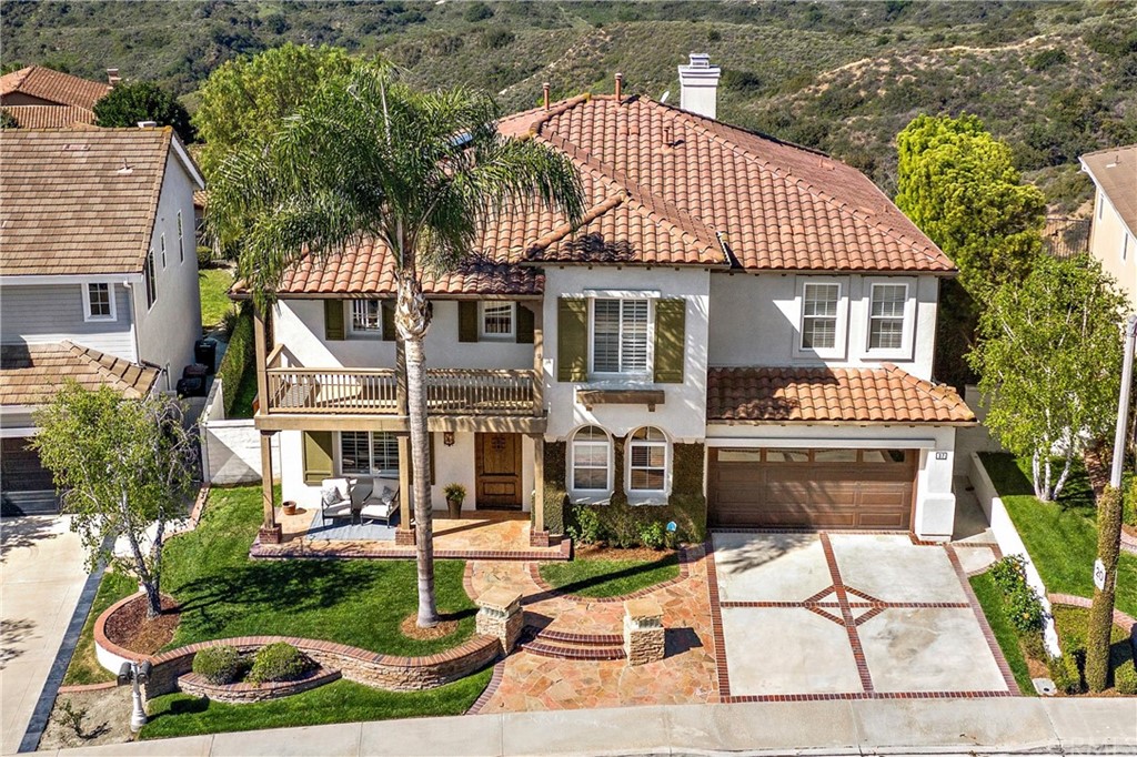 37 Oak View Drive Aliso Viejo, CA 92656 - Photo 45 of 46 a front view of a house with a garden