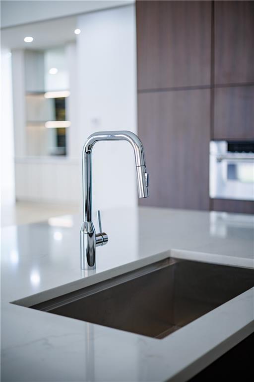 4805 Moore Road Suwanee, GA 30024 - Photo 22 of 119 a close view of sink and tap