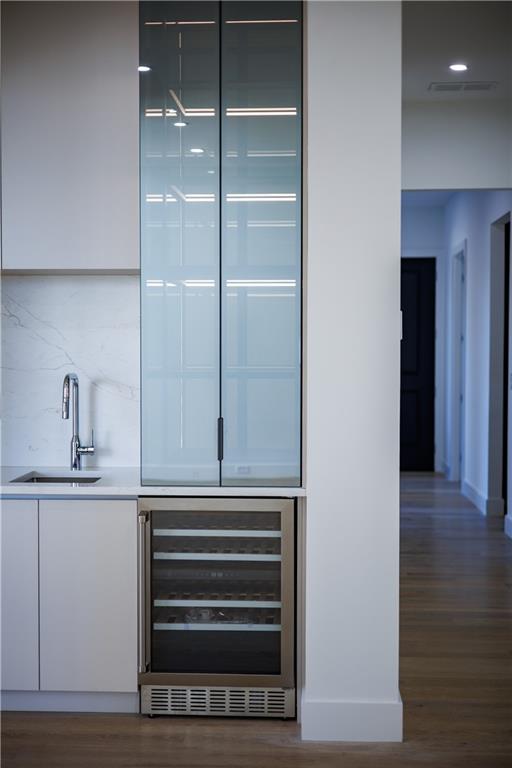 4805 Moore Road Suwanee, GA 30024 - Photo 27 of 119 a kitchen with a sink and cabinets