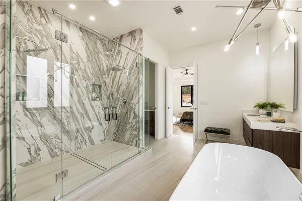 a view of an outdoor dining space with a table and chairs