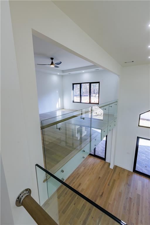 4805 Moore Road Suwanee, GA 30024 - Photo 65 of 119 a view of a room with wooden floor