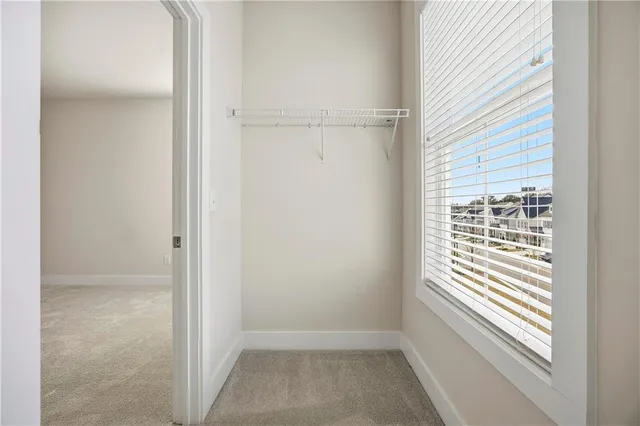 a view of a room that has a window