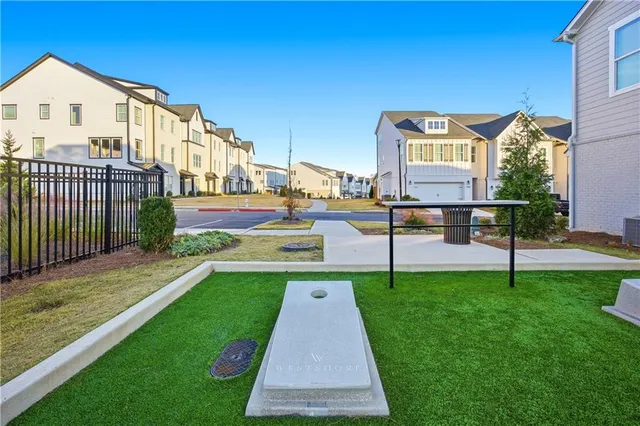 a view of a street in front of a house