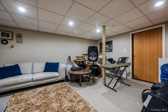 a work room with furniture and a window