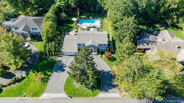 a view of a garden with a house