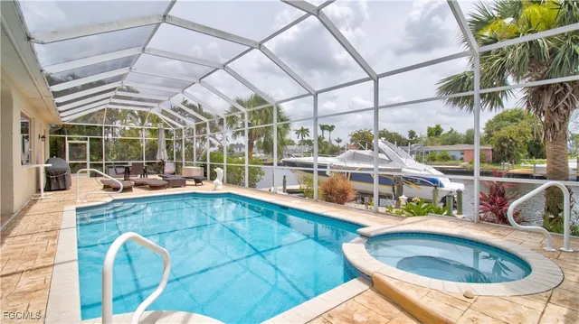 a view of a swimming pool with a patio