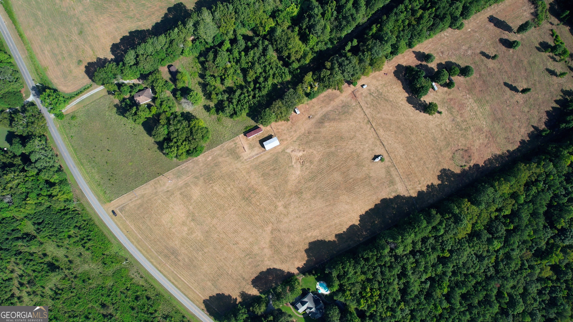 2911 A Sandy Creek Road Madison, GA 30650 - Photo 7 of 41 an aerial view of a house