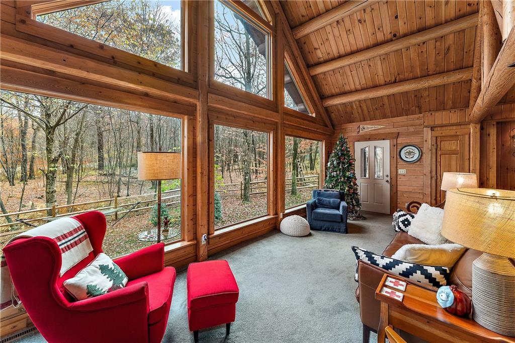 864 Camp Run Road Somerset, PA 15501 - Photo 3 of 44 a living room with furniture and floor to ceiling windows