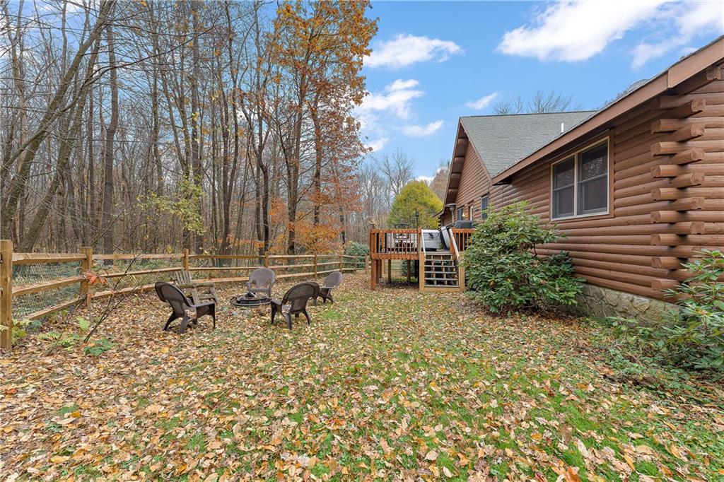 864 Camp Run Road Somerset, PA 15501 - Photo 34 of 44 a backyard of a house with table and chairs