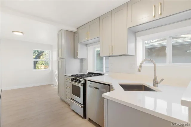 a view of a hallway with wooden shelves