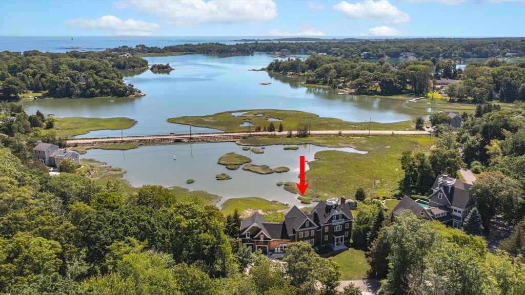 31 Bow Street Cohasset, MA 02025 - Photo 1 of 42 an aerial view of a house with a lake view