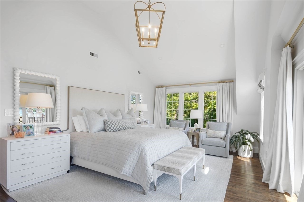 31 Bow Street Cohasset, MA 02025 - Photo 17 of 42 a bedroom with furniture and a large window