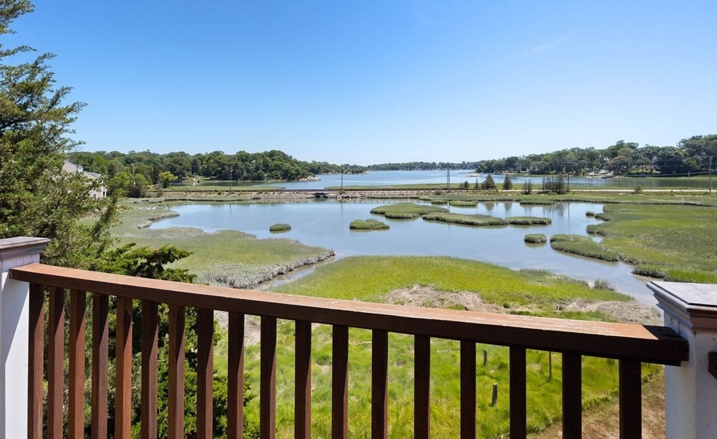 31 Bow Street Cohasset, MA 02025 - Photo 19 of 42 a view of a lake with a mountain view