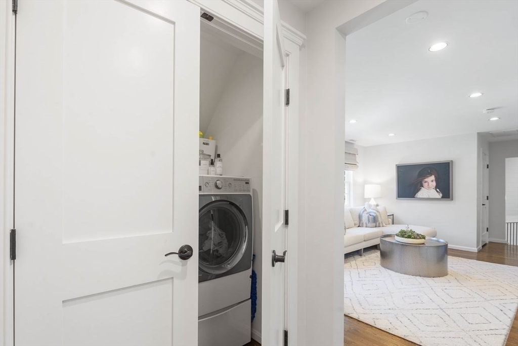31 Bow Street Cohasset, MA 02025 - Photo 25 of 42 a living room with furniture and a flat screen tv