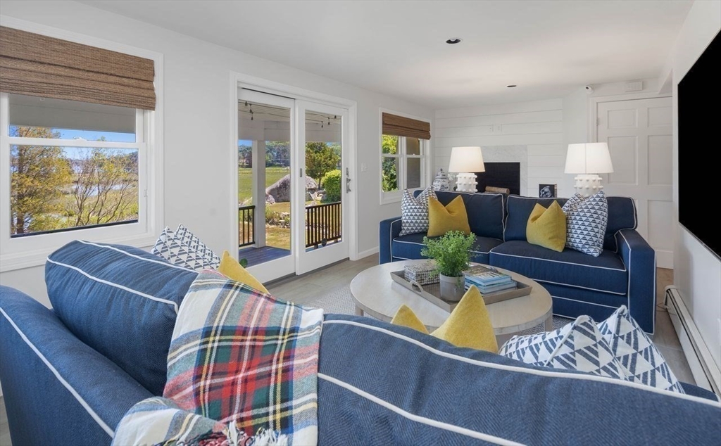 31 Bow Street Cohasset, MA 02025 - Photo 33 of 42 a living room with furniture and a flat screen tv