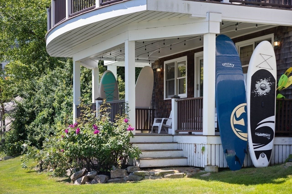 31 Bow Street Cohasset, MA 02025 - Photo 40 of 42 a front view of a house with garden