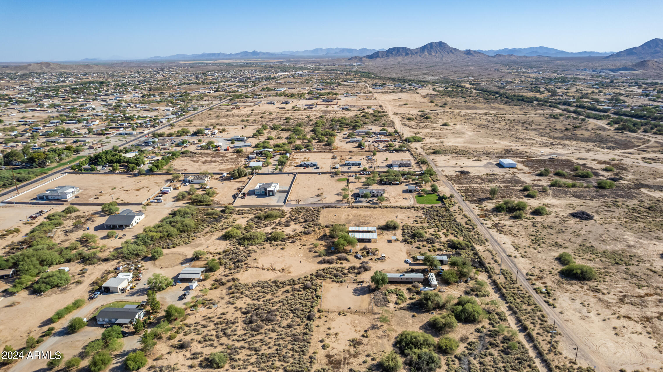 21235 West Elliot Road Buckeye, AZ 85326 - Photo 10 of 16 an aerial view of residential houses with outdoor space