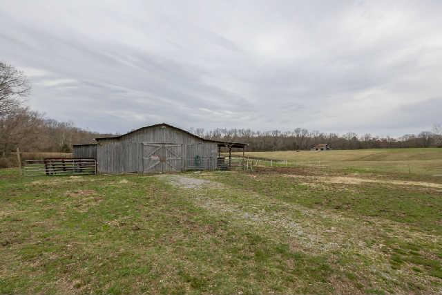 2039 Abiff Road Burns, TN 37029 - Photo 14 of 20 5 stall barn has run-in for horses and hay storage.