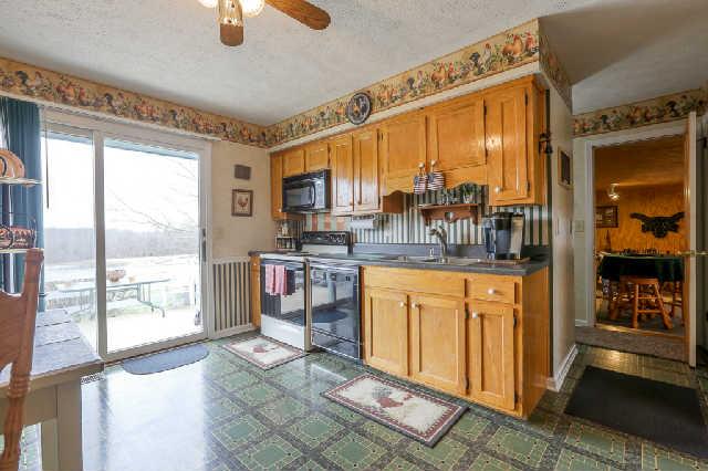 2039 Abiff Road Burns, TN 37029 - Photo 5 of 20 Eat-in kitchen. All appliances remain.