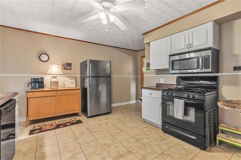 250 Neville Road Beaver, PA 15009 - Photo 12 of 25 Updated kitchen boasts plenty of space for breakfast nook.