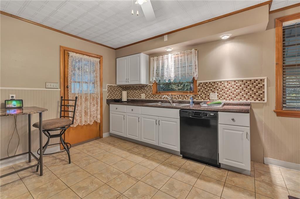 250 Neville Road Beaver, PA 15009 - Photo 13 of 25 kitchen has window by sink to view backyard activities.