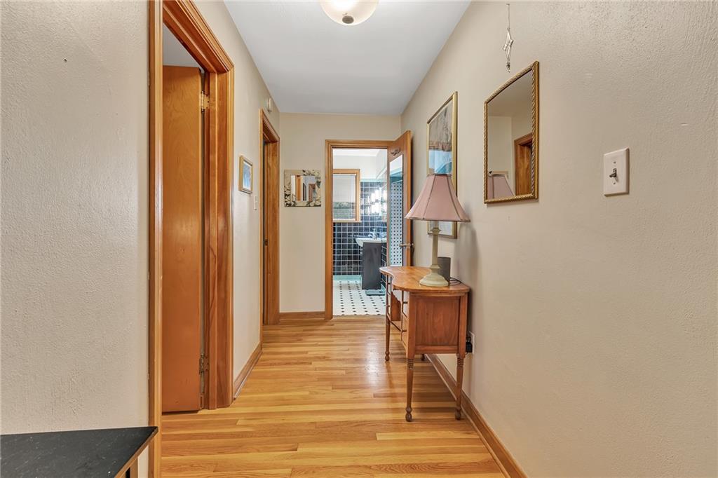 250 Neville Road Beaver, PA 15009 - Photo 17 of 25 spacious hallway has storage closet also.